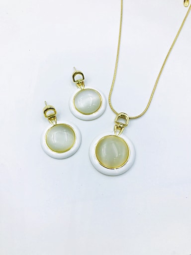 Classic Round Zinc Alloy Cats Eye White Enamel Earring and Necklace Set