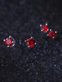 thumb Sterling silver four-prong red zircon mini earrings 0