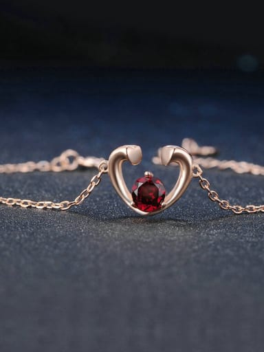 Hollow Heart-shape Silver Bracelet with Garnet