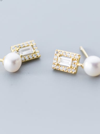 Simple cubic zircons of pure silver and imitation pearl earrings