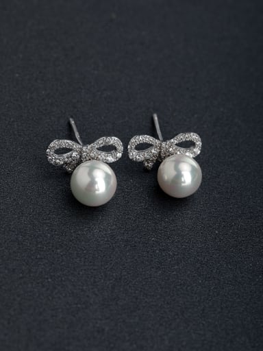Micro inlay Rhinestone Bowknot Imitation pearls 925 silver Stud earrings
