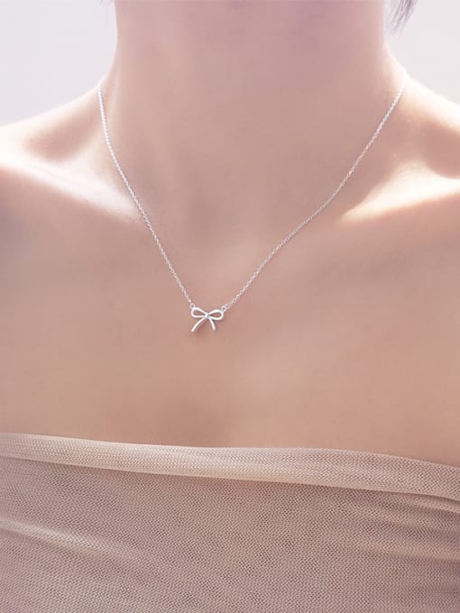 Peng Yuan Simple Tiny Bow Pendant 925 Silver Necklace 1