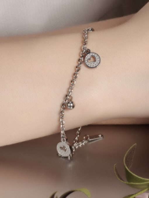 Open Sky Fashion Little Bells Hollow Heart Titanium Bracelet 1