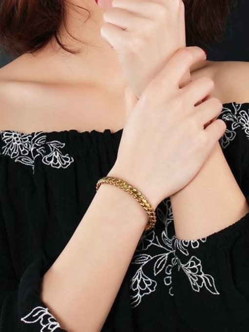 Golden Fashionable Gold Plated Twisted Titanium Bangle