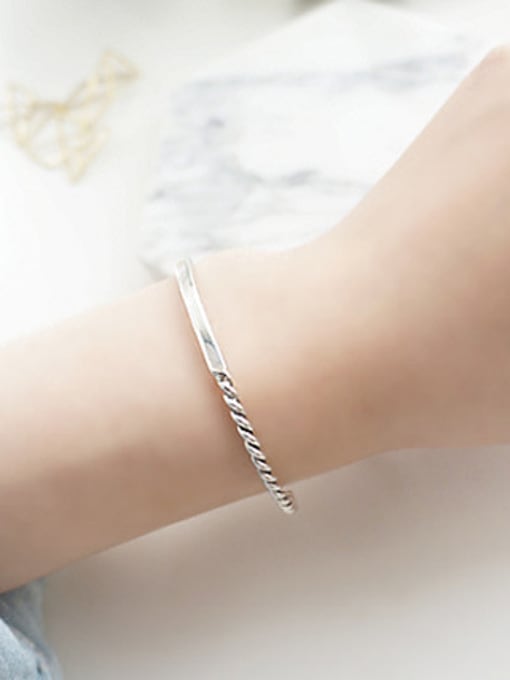 Peng Yuan Simple Silver Opening Twisted Bangle 1
