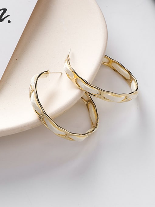 A white Alloy With Gold Plated Simplistic Round Hoop Earrings