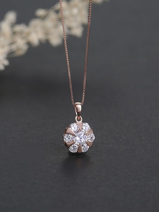 One Silver Rose Gold Plated Flower Shaped Pendant 2