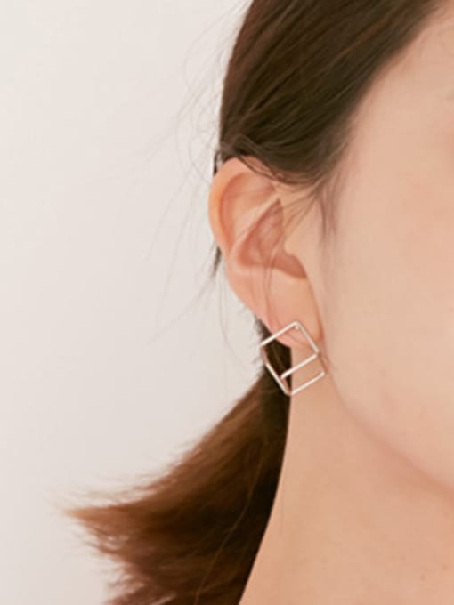 DAKA Simple Hollow Cube Silver Smooth Stud Earrings 1