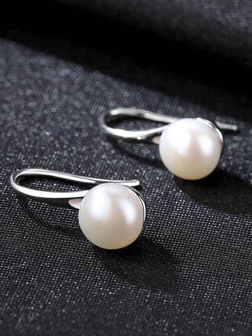 White Sterling silver spoon shaped 6-7mm natural freshwater pearl eardrop earring