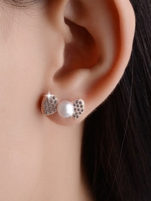 AI Fei Er Personalized Imitation Pearl Cubic Zirconias Bowknot Stud Earrings 1