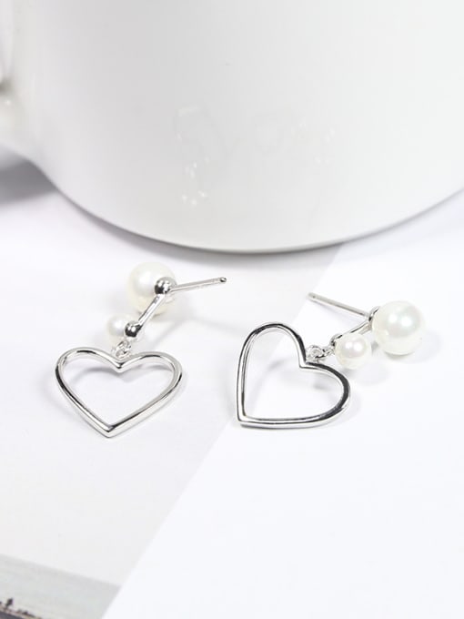 Peng Yuan Fashion Hollow Heart-shaped White Imitation Pearls 925 Silver Stud Earrings 1