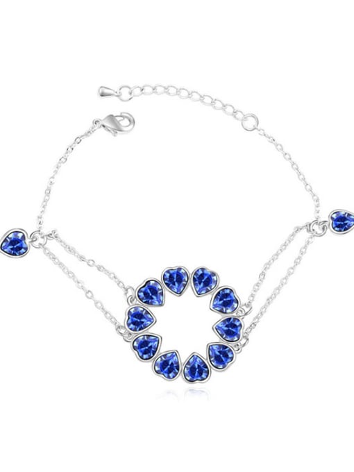 royal blue Chanz using austrian Elements Crystal Bracelet nestled in the heart to heart bracelet