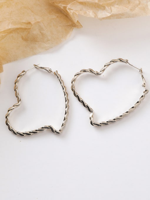 Main plan section Alloy With Gold Plated Simplistic  Hollow Heart Hoop Earrings