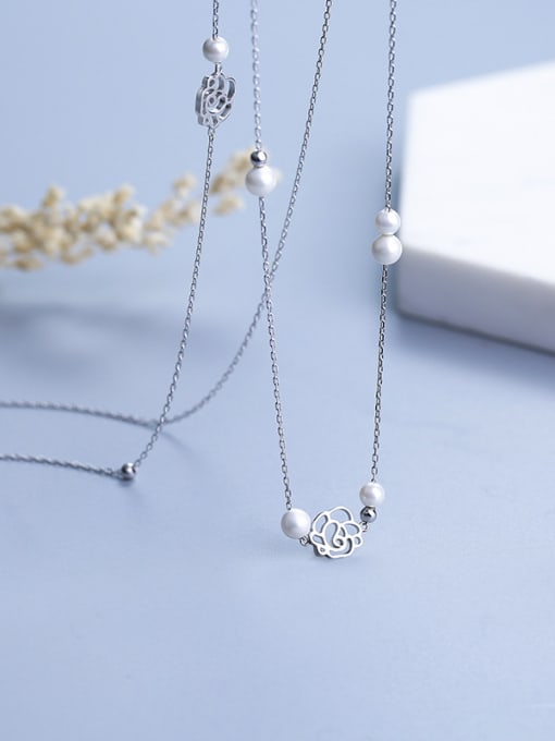 One Silver Flower Pearl Sweater Necklace