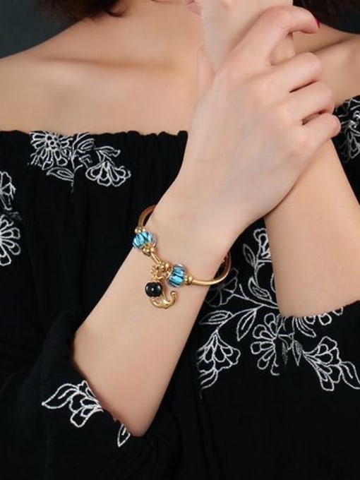 CONG Exquisite Gold Plated Cross Shaped Titanium Bracelet 1