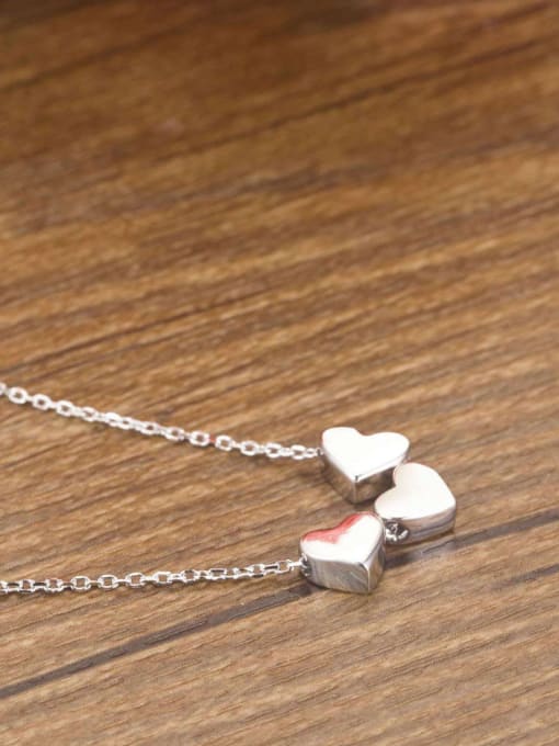 One Silver Three Heart Necklace 1
