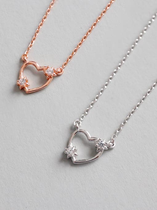 DAKA Sterling Silver with miniature zircon hollow heart Necklace