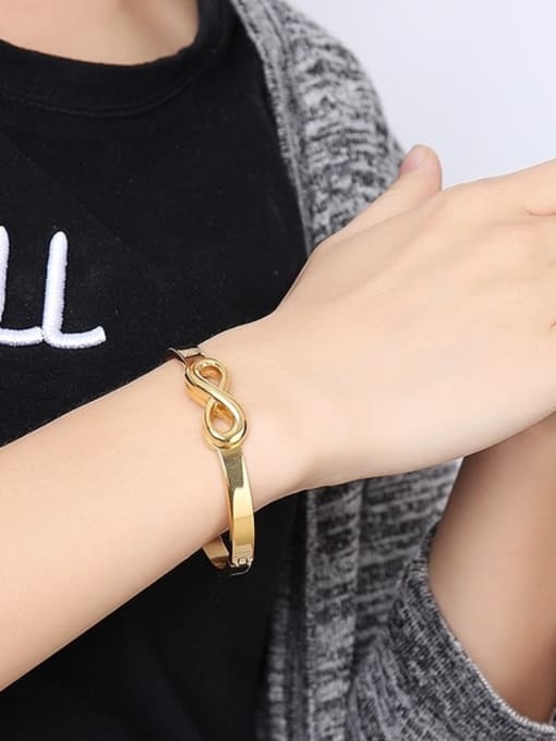 CONG Trendy Gold Plated Figure Eight Shaped Titanium Bangle 1