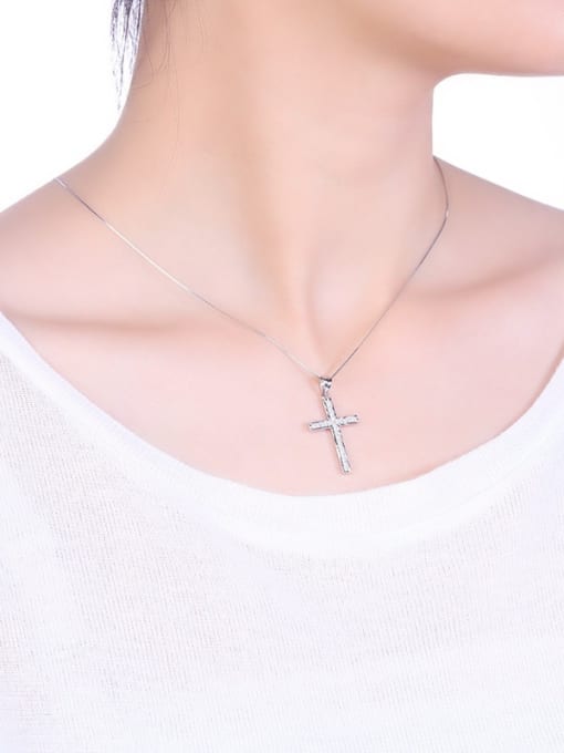 One Silver Cross Shaped Pendant 1