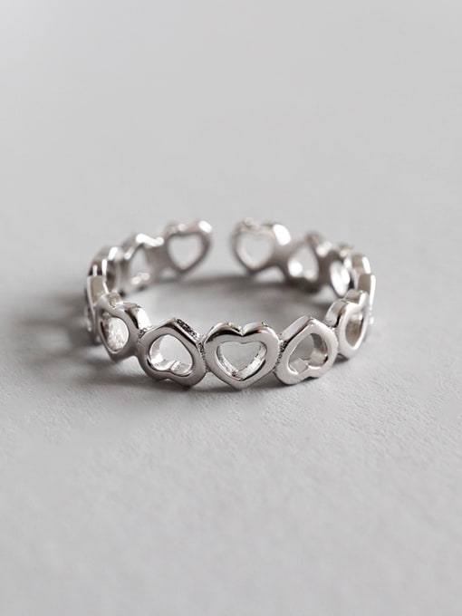 DAKA 925 Sterling Silver With Platinum Plated Simplistic hollow Heart Free Size Rings