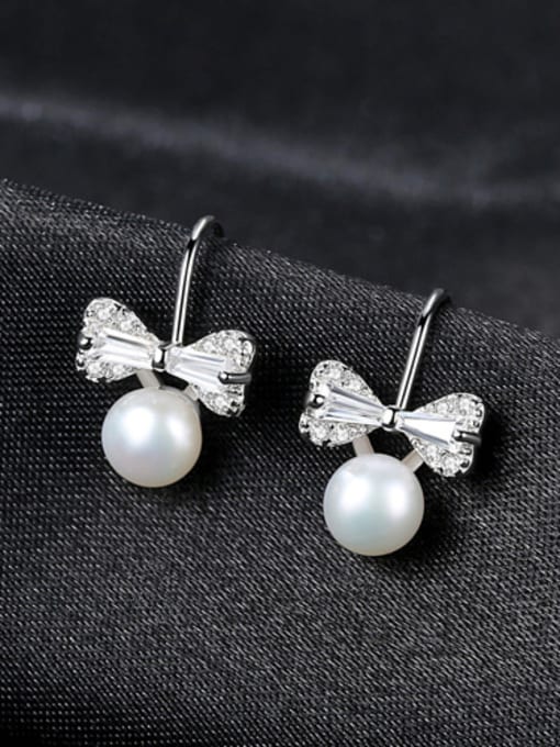 White Pure silver natural freshwater pearl cute bow tie studs