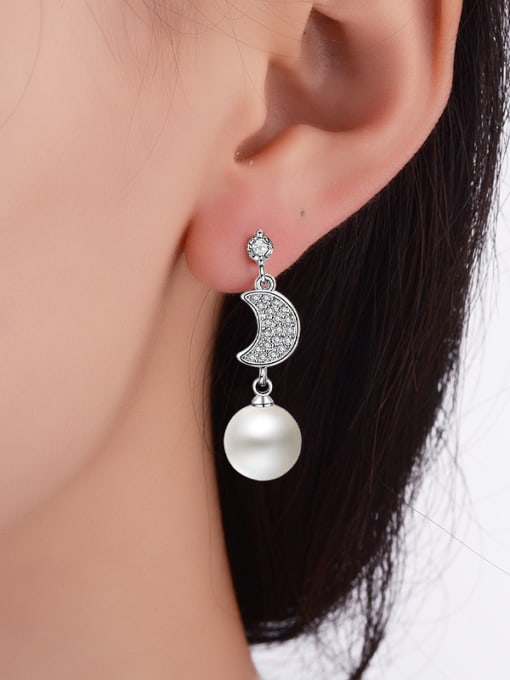 AI Fei Er Personalized Asymmetrical Moon Star Imitation Pearl Copper Stud Earrings 2