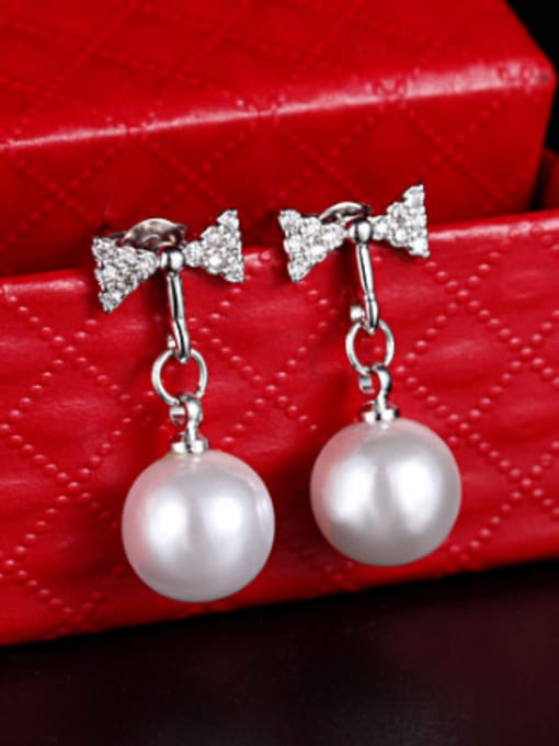 Rosh Fashion Tiny Zirconias Bowknot Imitation Pearl Stud Earrings 1