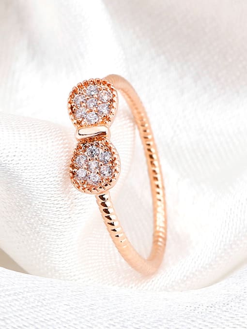 OUXI 18K Rose Gold Bowknot Shaped Zircon Ring 1