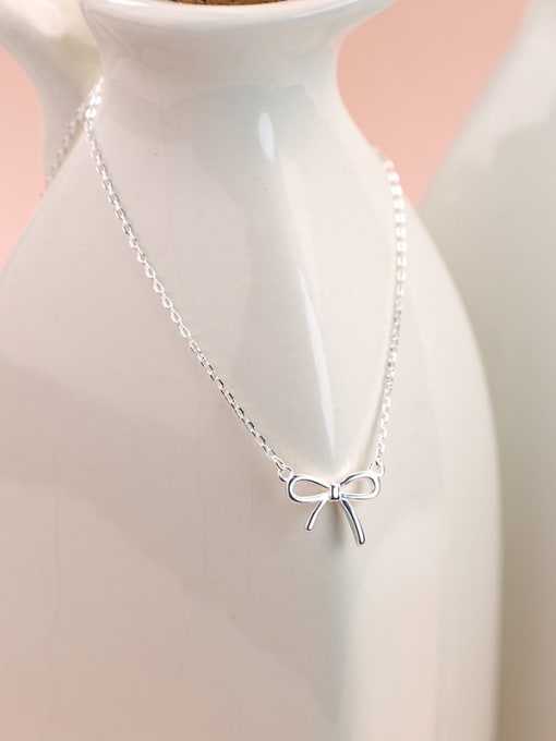 Peng Yuan Simple Tiny Bow Pendant 925 Silver Necklace 0
