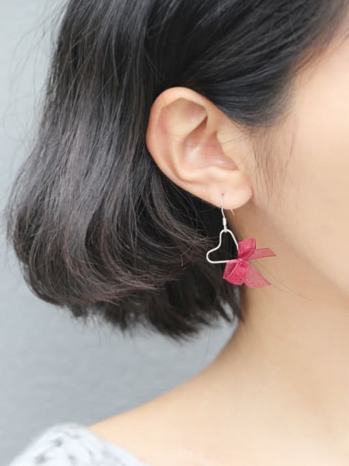 Peng Yuan Fashion Hollow Heart Bowknot 925 Silver Earrings 1