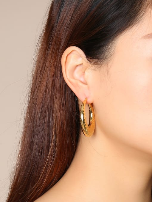 CONG Stainless Steel With Gold Plated Simplistic Hollow Wave Point  Round Hoop Earrings 1