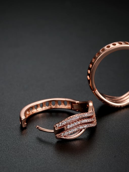 UNIENO Micro-inlay zircon water-ripple bling bling classic Earrings 1