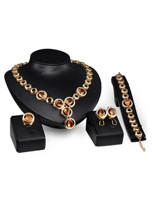 BESTIE Alloy Imitation-gold Plated Fashion Artificial Stones Hollow Round-shaped Four Pieces Jewelry Set 0