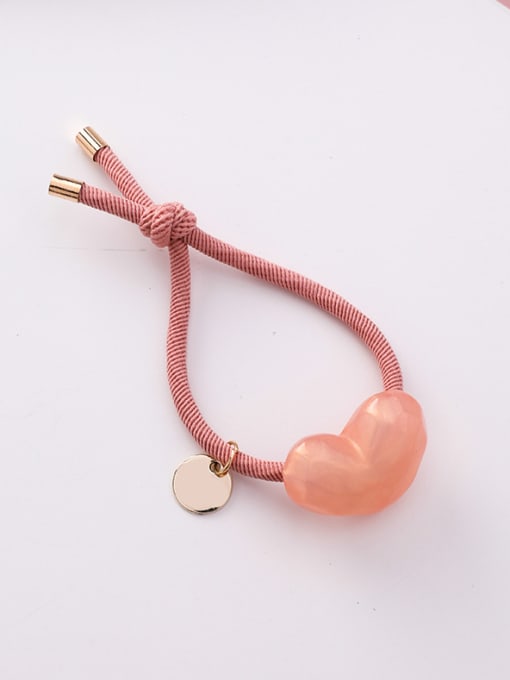A Pink Candy color heart-shaped hair rope