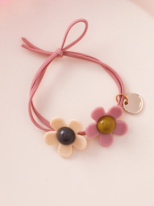 A Pink Rubber Band With Cut Sun Flower Hair Ropes