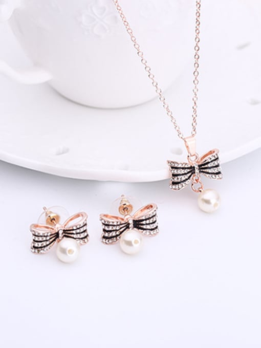BESTIE Alloy Rose Gold Plated Fashion Artificial Pearl Bowknot Two Pieces Jewelry Set 1