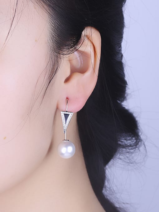 One Silver Triangle Shaped Shell Stud Earrings 1