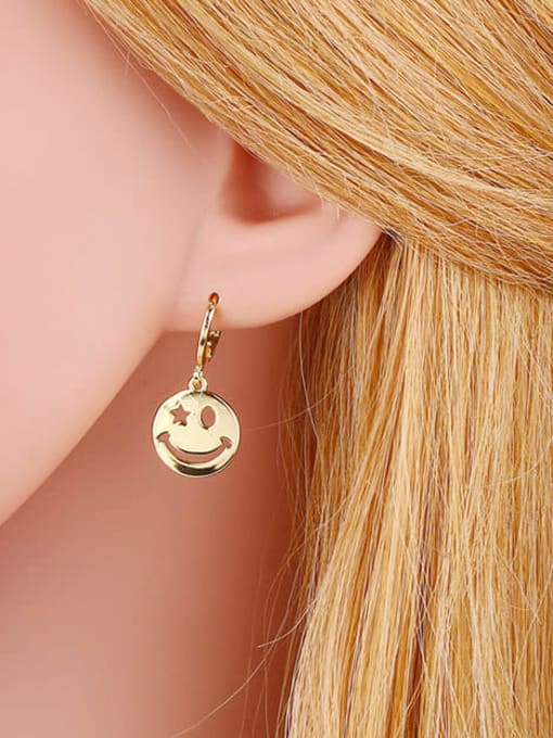 CC Brass Hollow Smiley Minimalist Huggie Earring 1