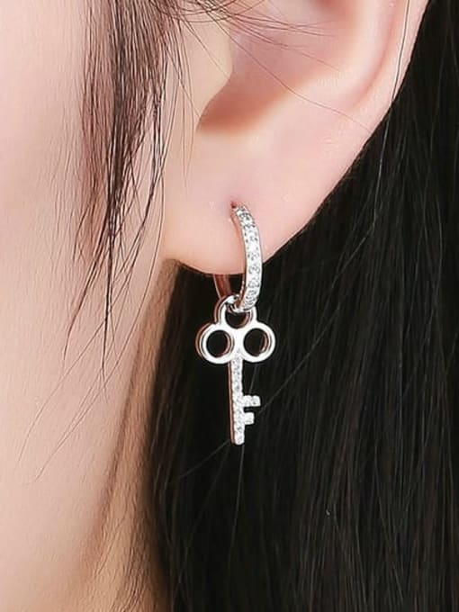 Jare 925 Sterling Silver Cubic Zirconia Asymmetrical Key Heart Dainty Huggie Earring 1