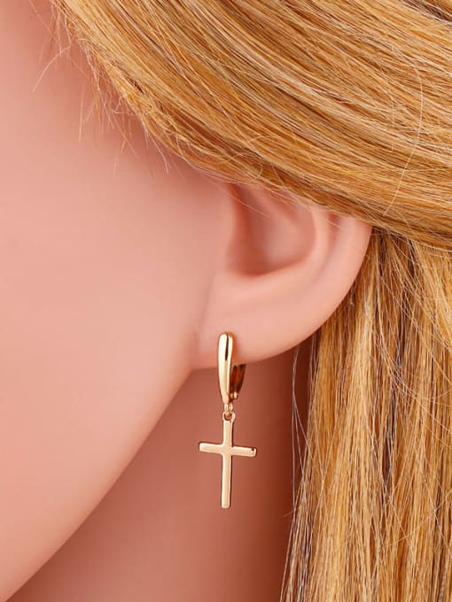CC Brass Cross Minimalist Huggie Earring 2