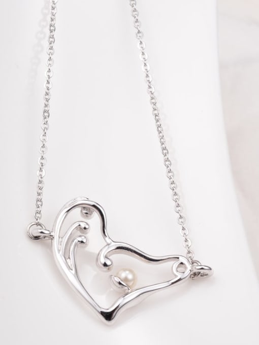 A TEEM Titanium Hollow heart Minimalist pendant Necklace 1