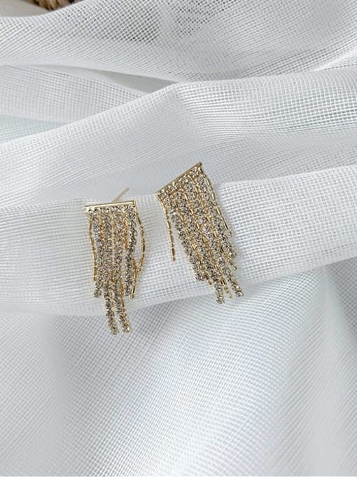 A wide Edition Zinc Alloy Rhinestone White Irregular Classic Tassel Earrings