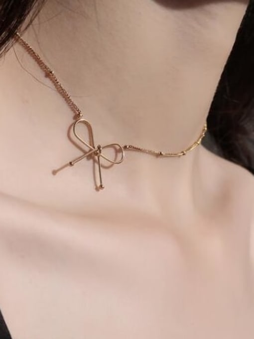 A TEEM Titanium Hollow Bowknot Minimalist pendant Necklace 2