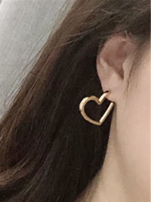 Clioro Brass Hollow   Heart Minimalist Stud Earring 1