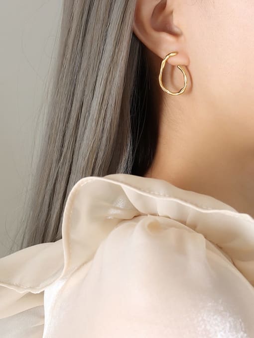 A pair of gold earrings Titanium Steel Geometric Trend Hoop Earring