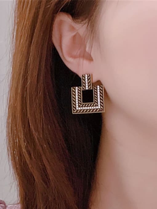 Clioro Brass Cubic Zirconia Geometric Vintage Drop Earring 1