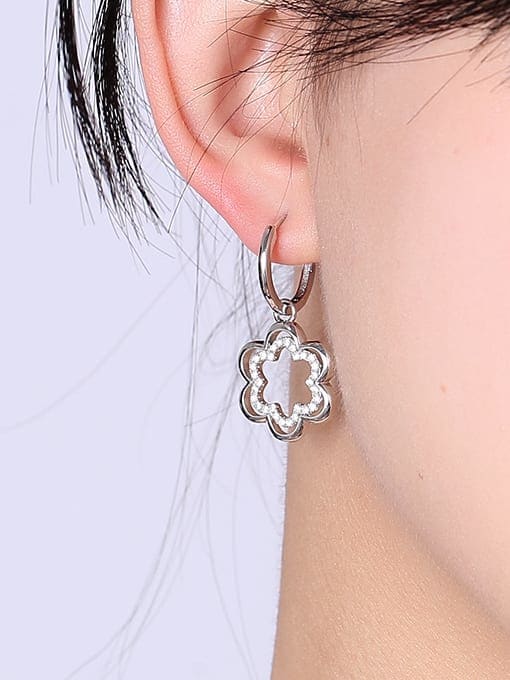 Clioro Brass Cubic Zirconia Flower Minimalist Huggie Earring 1