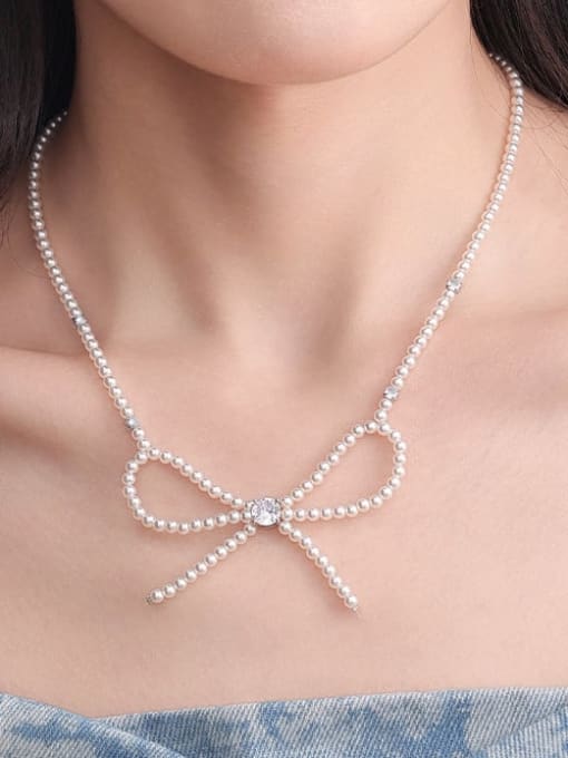 TINGS Brass Imitation Pearl Bowknot Minimalist Beaded Necklace 1