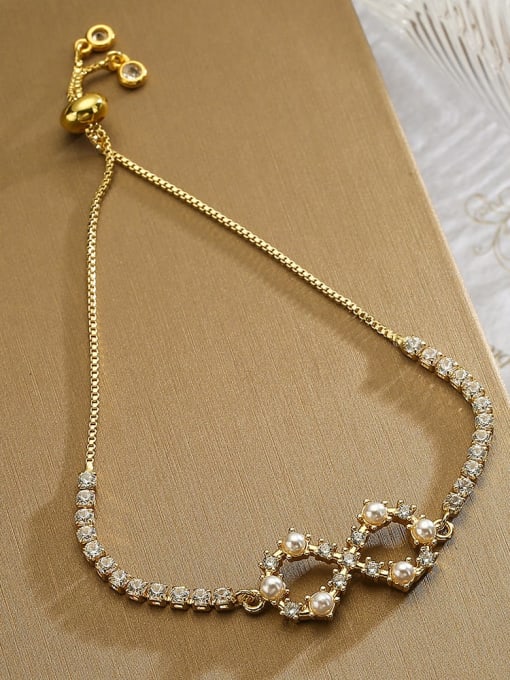 AOG Brass Imitation Pearl Bowknot Dainty Bracelet 2
