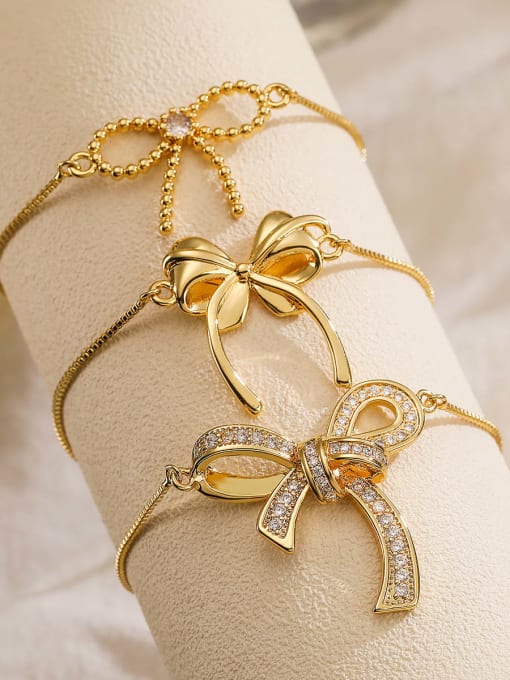 AOG Brass Cubic Zirconia Bowknot Minimalist Adjustable Bracelet